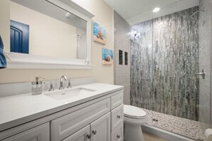 Shower, hair dryer, towels