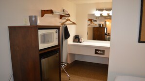 A compact hotel room with a kitchenette, including a microwave, refrigerator, and coffee maker. - #30- TWO QUEEN BEDS in enjoyable Columbia Falls with WiFi, AC, 20m mi to GNP!! (Columbia Falls)