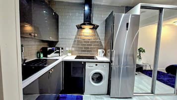 Apartment | Private kitchen | Fridge, microwave, stovetop, electric kettle