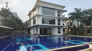 Enjoy a stylish living space with a spacious balcony and expansive views.