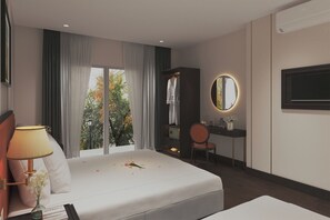 Superior tweepersoonskamer | Luxe beddengoed, een kluis op de kamer, een bureau, een laptopwerkplek