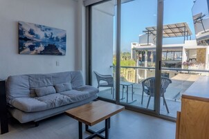 Deluxe Suite | Living area | 42-inch Smart TV with digital channels