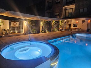 Outdoor pool, open 9:00 AM to 9:00 PM, pool umbrellas - Hotel y Departamentos Sofia (Rincón de Guayabitos)