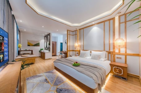 Luxury Suite, City View | 2 bedrooms, in-room safe, desk, blackout drapes