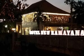 A hotel with a prominent sign, a two-story structure, and a visible entrance. - New Ramayana Pamekasan (Pamekasan)