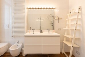 Shower, hair dryer, bidet, shampoo