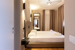 1 غرفة نوم ومكواة/لوح كي وواي فاي وملاءات أسرّة