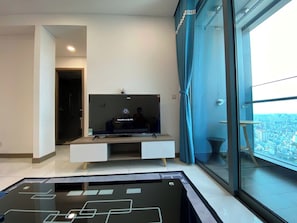 Appartement Deluxe, 1 chambre, vue ville | Coin séjour