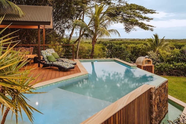 Enjoy full use of the pizza oven, outdoor firepit & pool during your stay