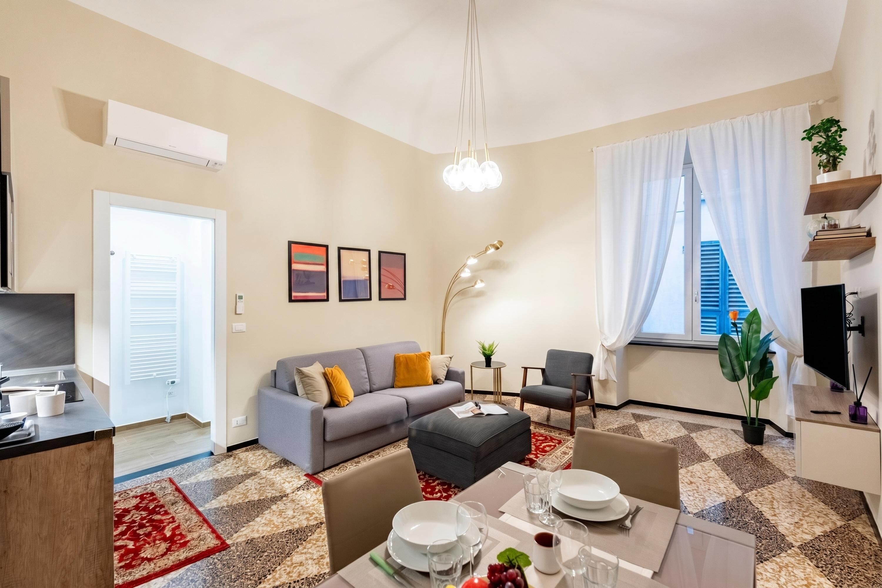 อพาร์ทเมนท์สำหรับครอบครัว, หลายห้องนอน (Lovely Flat In Genova Historic Center) | บริเวณนั่งเล่น | ทีวีจอแบน 21 นิ้ว พร้อมช่องดิจิตอล