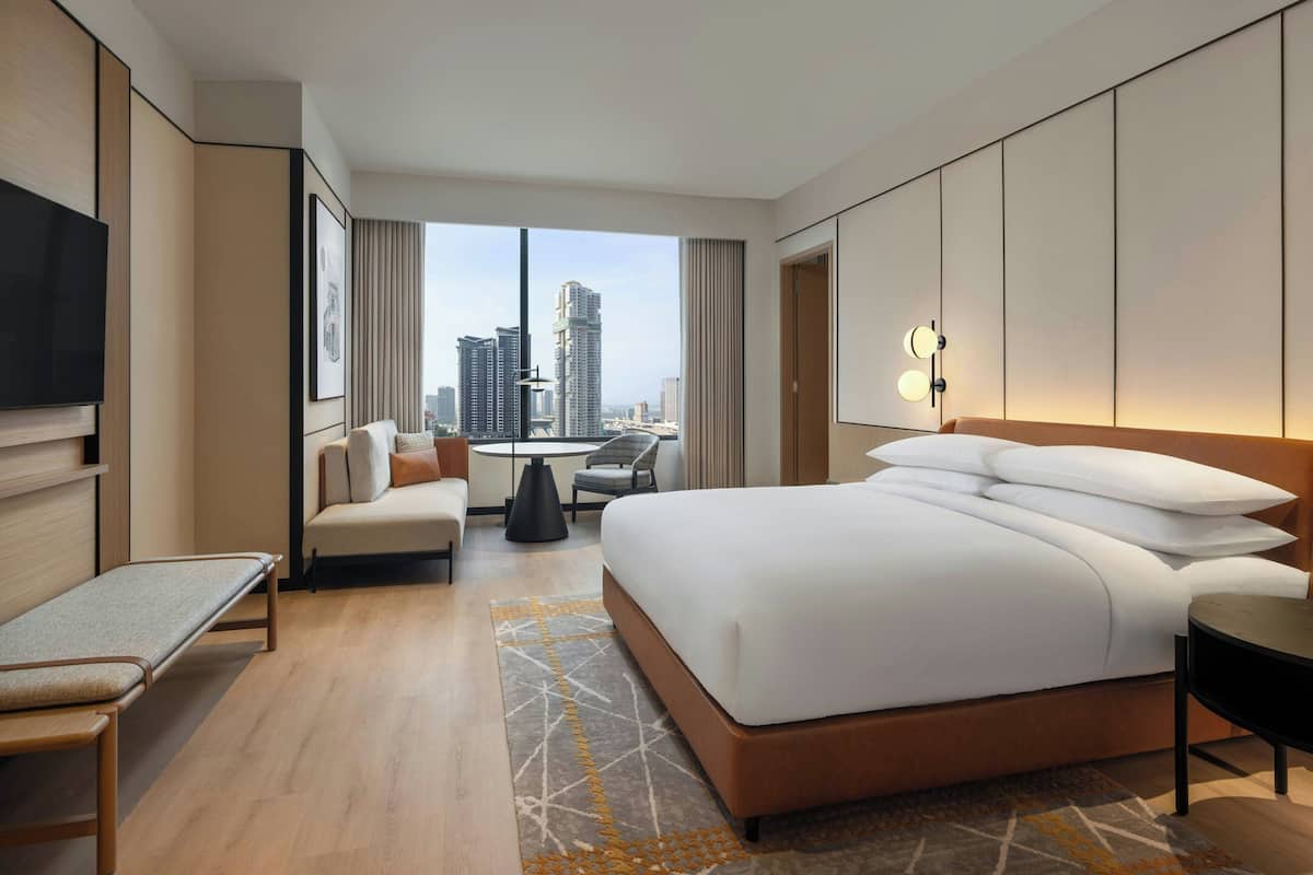 Family Suite, 2 Bedrooms | Minibar, in-room safe, blackout drapes, soundproofing