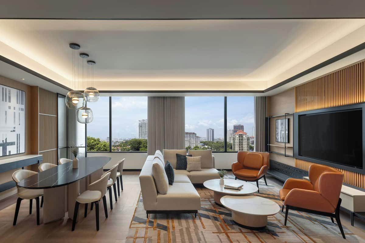 Presidential Suite, 1 King Bed | Living room | 55-inch LED TV with satellite channels