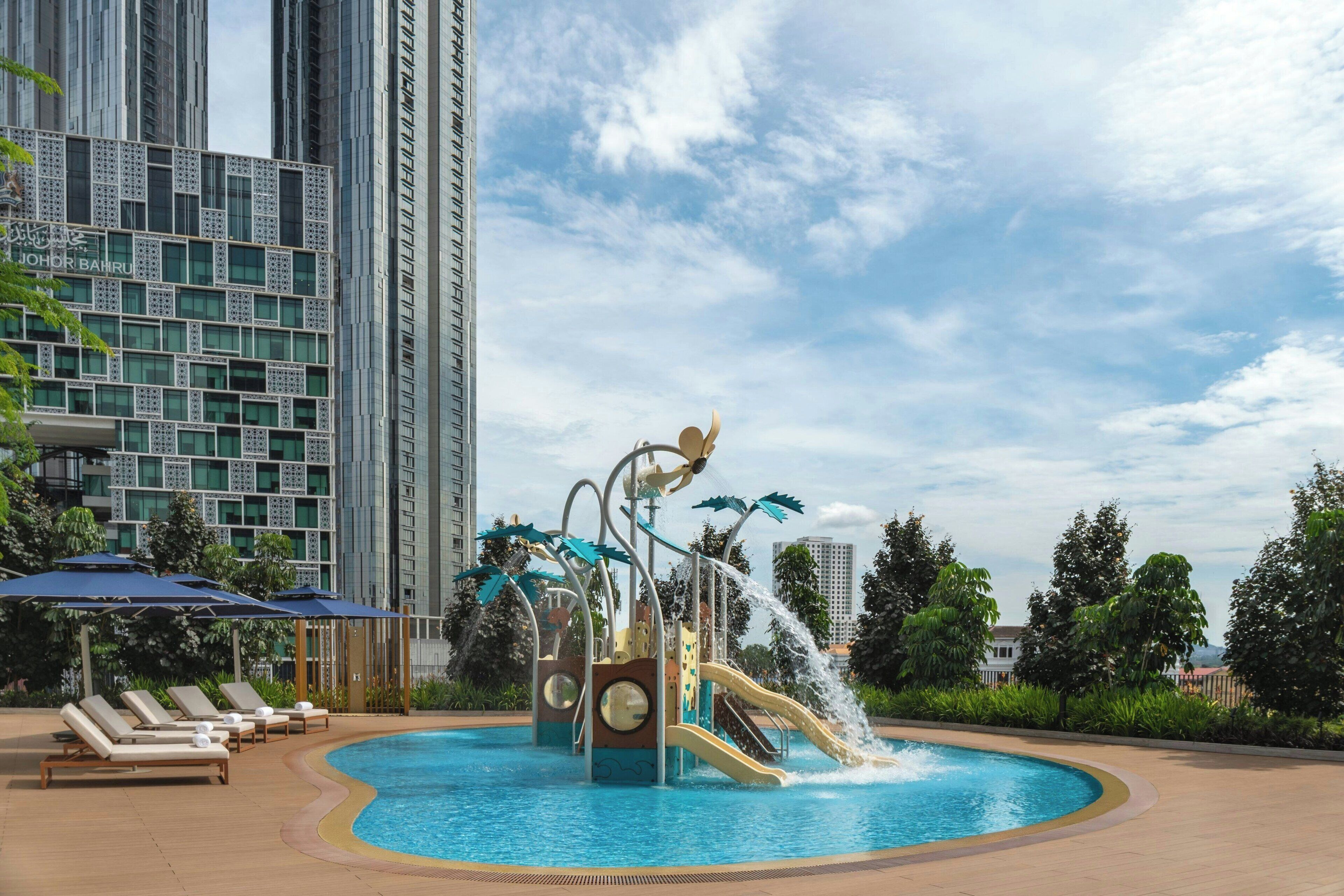 2 outdoor pools, open 7:00 AM to 9:00 PM, pool umbrellas, pool loungers