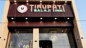 A building with a sign reading "TIRUPATI BALAJI INN". - Tirupati Balaji Inn Bageshwar Dham (Rajnagar)