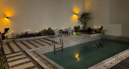 A villa with private pool, 3 floors, beautiful views, and complete amenities.