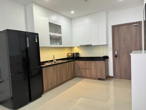 Fridge, microwave, stovetop, cookware/dishes/utensils - The OPAL Pearl Residences (Ho Chi Minh City)