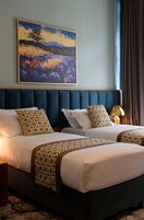 Superior Double or Twin Room, City View | Minibar, soundproofing, iron/ironing board, cribs/infant beds