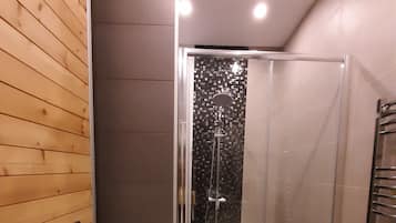 Shower, free toiletries, hair dryer, slippers