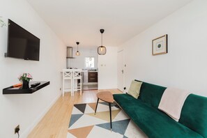 Appartement Deluxe, vue ville | Coin séjour