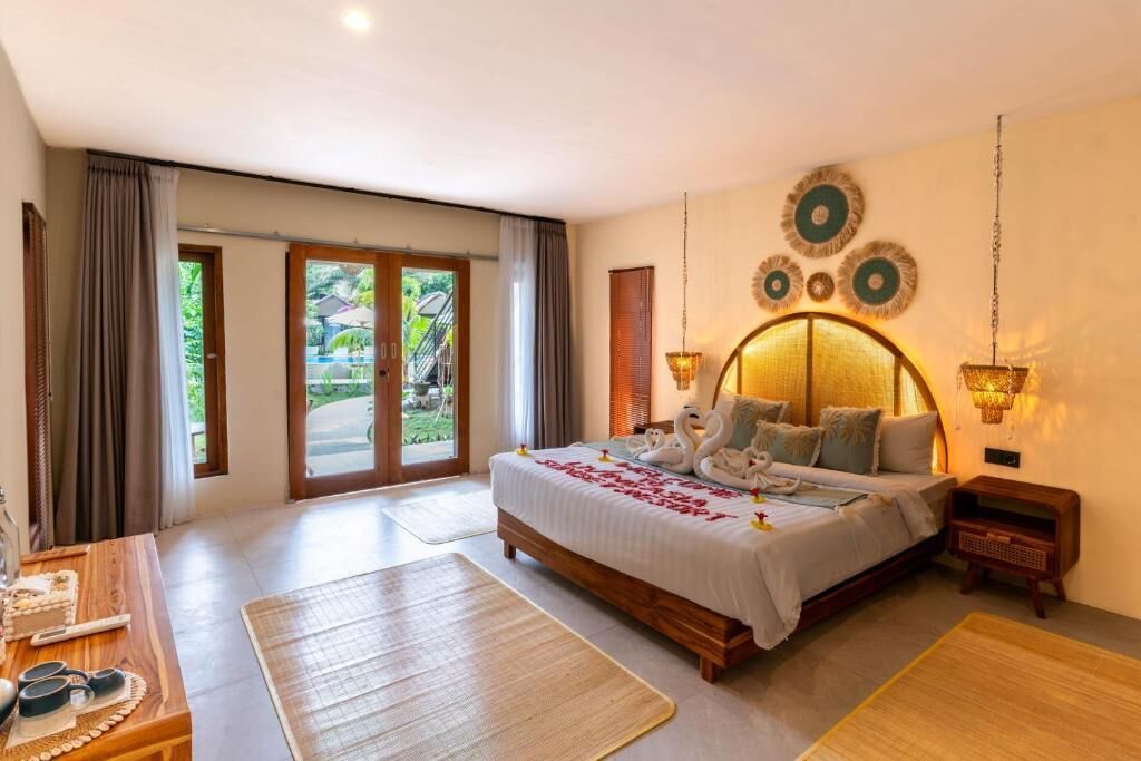 Deluxe Double Room, Balcony, Pool View | In-room safe, iron/ironing board, WiFi (free)