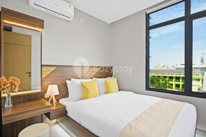 Apartment, 2 Bedrooms, City View | Desk, laptop workspace, iron/ironing board, free WiFi - Savya Aparthotel by Kozystay - Bandung (Bandung)