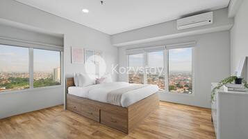 Apartment, 3 Bedrooms, City View | Desk, laptop workspace, iron/ironing board, free WiFi