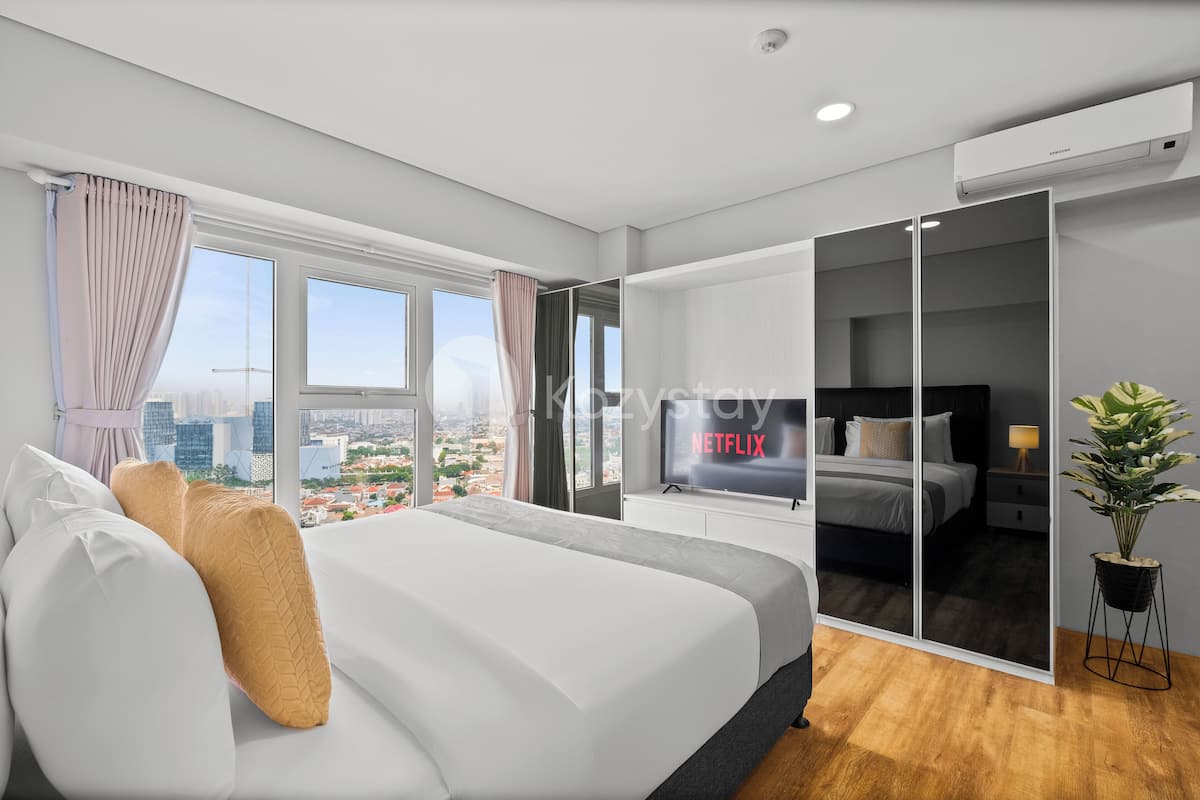 Appartamento, 2 camere da letto, vista città | 2 camere, una scrivania, postazione laptop, ferro/asse da stiro