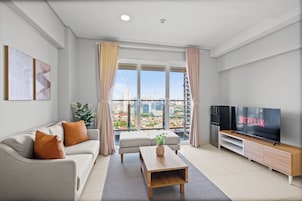 Apartamento, 2 quartos, vista para a cidade | Área de estar