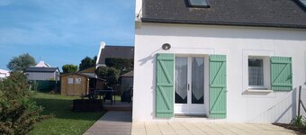 House near beach and shops with garden