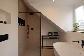 Shower, hair dryer, towels, soap