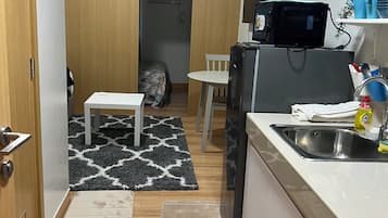 Fridge, microwave, coffee/tea maker, spices