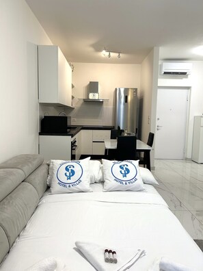 1 quarto, Wi-Fi de cortesia, roupa de cama