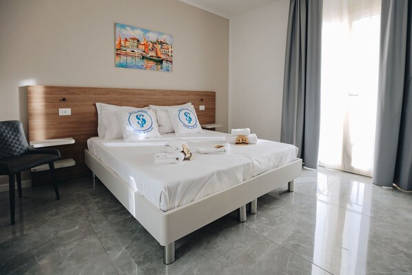 1 habitación, tabla de planchar con plancha, wifi gratis y ropa de cama