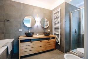 Shower, hair dryer, bathrobes, towels