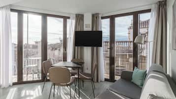 One-Bedroom Comfort Apt with balcony | Living area