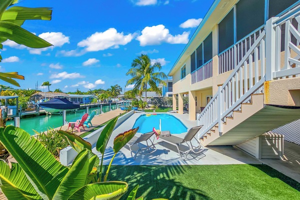 Enjoy a beautiful day by your private pool, relaxing on a lounger with your favorite book in hand.