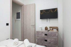 1 habitación, tabla de planchar con plancha y wifi gratis 