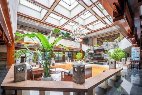 Taibai Restaurant Boutique Garden Hotel (West to Jining North Bus Station)