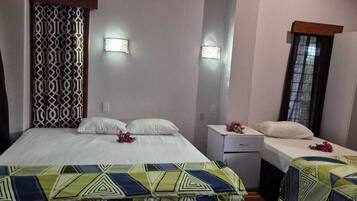 Luxury Double or Twin Room, Multiple Beds, Balcony, Courtyard View | Frette Italian sheets, premium bedding, down comforters