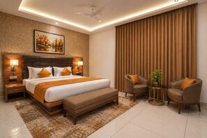 In-room safe, desk, laptop workspace, iron/ironing board - Hotel JMK - Managed by JMD Group (New Delhi)