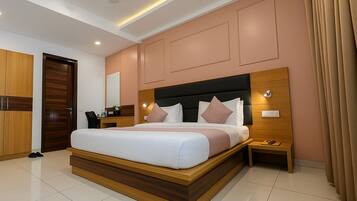 Deluxe Room | In-room safe, desk, laptop workspace, iron/ironing board