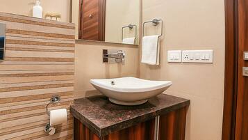 Shower, free toiletries, hair dryer, slippers