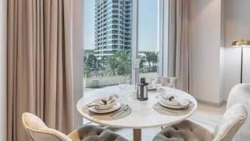 Luxury Apartment, City View | In-room dining