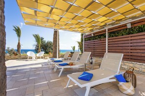 Terrace/patio - Beachfront Oasis: 5 Bed Villa With Stunning Pool (Agios Theodoros)