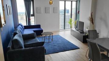 Apartamento | Área de estar | TV