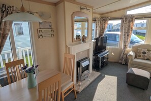 Cabin | Living area | TV, fireplace - Beachcomber Cabin, Dog Friendly - Anderby Creek (Skegness)