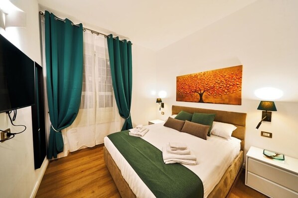 1 bedroom, desk, iron/ironing board, travel cot