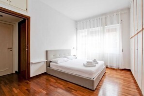 1 bedroom, desk, iron/ironing board, travel crib