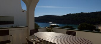 Magnificent apartment overlooking Cala Montgo 1st.line Large terrace