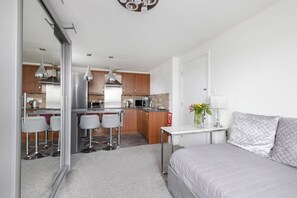 Comfort Apartment, City View | Living area | LCD TV